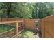 Fenced dog park with pet waste station, providing a safe and clean area for pets to play at 1309 Hudson Ave # D6, Durham, NC 27705