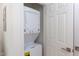 Efficient laundry area with stacked washer and dryer, and a closet door for concealment at 1309 Hudson Ave # D6, Durham, NC 27705