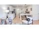 Open-concept living space combining a living room with modern seating and a kitchen with sleek countertops and appliances at 1309 Hudson Ave # D6, Durham, NC 27705