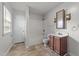 Functional bathroom with a tub-shower combination and a vanity with ample storage at 1402 Tarleton Ave, Burlington, NC 27215