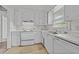 Bright kitchen with classic white cabinets and essential appliances at 1402 Tarleton Ave, Burlington, NC 27215