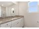 Bathroom with double sink vanity, granite counters and white cabinets at 150 Ivy Bank Dr, Angier, NC 27501