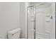 Bathroom with glass enclosed shower and white toilet at 150 Ivy Bank Dr, Angier, NC 27501