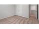 This bedroom has neutral walls, carpeting, and double door closet at 150 Ivy Bank Dr, Angier, NC 27501
