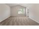 Bright bedroom features carpeted floors, vaulted ceilings and ensuite bath at 150 Ivy Bank Dr, Angier, NC 27501