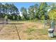 Community dog park with waste station at 150 Ivy Bank Dr, Angier, NC 27501