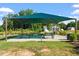Community pavilion with picnic tables and a grill for outdoor gatherings at 150 Ivy Bank Dr, Angier, NC 27501