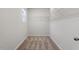 Spacious walk-in closet features wire shelving and neutral carpeting for organized storage at 150 Ivy Bank Dr, Angier, NC 27501