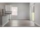 Bright dining area featuring hardwood floors and sliding glass doors to the backyard at 154 Taverners Ln, Angier, NC 27501