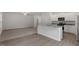 Contemporary kitchen with granite countertops, stainless steel appliances, and ample cabinet space at 154 Taverners Ln, Angier, NC 27501