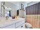 Bathroom featuring a vanity, a toilet, and a shower with a striped curtain at 1624 Struble Cir, Willow Springs, NC 27592