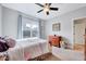 Cozy bedroom with plush carpet, natural light, and neutral color palette at 1624 Struble Cir, Willow Springs, NC 27592