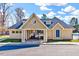 Exterior of community clubhouse with well-kept grounds and easy access for neighborhood residents at 1624 Struble Cir, Willow Springs, NC 27592