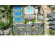 Stunning aerial view of community pool, tennis courts, clubhouse, and play area at 2120 Rainy Lake St, Wake Forest, NC 27587