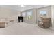 Bonus room with plush carpeting, neutral walls, and natural light from multiple windows at 2120 Rainy Lake St, Wake Forest, NC 27587
