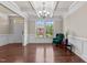 Elegant dining room with coffered ceilings, hardwood floors, and natural light at 2120 Rainy Lake St, Wake Forest, NC 27587