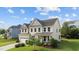 Beautiful home with well-maintained lawn and mature trees in a desirable neighborhood at 2120 Rainy Lake St, Wake Forest, NC 27587