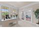 Bright home office with french doors and large windows offering natural light at 2120 Rainy Lake St, Wake Forest, NC 27587