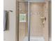 This bathroom features a tiled shower with glass doors at 2120 Rainy Lake St, Wake Forest, NC 27587