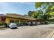 Commercial building exterior showcasing multiple storefronts and ample parking at 219 W Columbia Pl, Chapel Hill, NC 27516