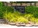 Stone sign with lush landscaping for Columbia Place at 219 W Columbia Pl, Chapel Hill, NC 27516