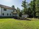 Spacious backyard featuring a firepit and a storage building, perfect for outdoor activities at 221 Stella Way, Cameron, NC 28326