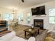 Spacious living room with fireplace and open to breakfast nook for easy entertaining at 221 Stella Way, Cameron, NC 28326