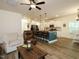 Open concept living space features a kitchen island and comfortable seating area at 221 Stella Way, Cameron, NC 28326