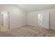 Spacious bedroom with two doors, carpet and neutral paint to go with all décor at 224 Ivy Bank Dr, Angier, NC 27501