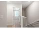Hallway view looking into bedroom with natural light, neutral colors and wall to wall carpet at 224 Ivy Bank Dr, Angier, NC 27501