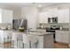 Updated kitchen featuring granite countertops, stainless appliances, and bright white cabinetry at 224 Ivy Bank Dr, Angier, NC 27501
