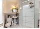 Bathroom featuring a pedestal sink and a modern frosted glass shower at 233 Pressly Foushee Rd, Sanford, NC 27330