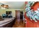 Inviting living room featuring a rustic barn door, hardwood floors, and a view into the dining area at 233 Pressly Foushee Rd, Sanford, NC 27330