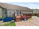 View of a wood back deck and stamped concrete patio, perfect for entertaining at 236 Emma Ct, Linden, NC 28356