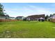 Spacious, green backyard is fully fenced and ready for games and Gathering fun at 236 Emma Ct, Linden, NC 28356