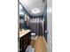 This bathroom includes a single sink vanity, ceramic tile flooring, and a tub and shower at 236 Emma Ct, Linden, NC 28356
