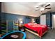 Inviting bedroom featuring a ceiling fan and space for a play area or home gym at 236 Emma Ct, Linden, NC 28356