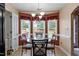Cozy breakfast nook with large windows and a round table perfect for morning meals at 236 Emma Ct, Linden, NC 28356