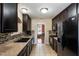 Efficient kitchen with stainless steel appliances offers plenty of space at 236 Emma Ct, Linden, NC 28356
