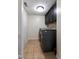 Convenient laundry room with modern appliances and ample cabinet space for storage at 236 Emma Ct, Linden, NC 28356