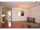 Dining area featuring hardwood floors, wainscoting, and an opening to the kitchen at 2507 Princewood St, Raleigh, NC 27612