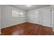 Bright bedroom features natural light and wood flooring at 2512 Mckinney St, Burlington, NC 27217
