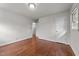 Bedroom showcasing hardwood floors, neutral walls, and a closet at 2512 Mckinney St, Burlington, NC 27217