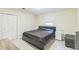This bedroom has a full-sized bed with a grey comforter at 2712 Pebblebrook Dr, Sanford, NC 27330