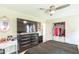 Spacious main bedroom with large closet, black dresser, and ample natural light at 2712 Pebblebrook Dr, Sanford, NC 27330