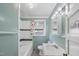 Bathroom featuring a shower-tub combo, white fixtures, and clean design at 2715 E Geer St, Durham, NC 27704