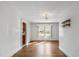 Cozy dining area featuring hardwood floors and a decorative chandelier at 2715 E Geer St, Durham, NC 27704