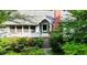 Charming front entrance with lush landscaping, brick accents, and a welcoming entryway at 2715 E Geer St, Durham, NC 27704