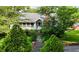 Charming one-story home with lush landscaping and inviting entrance at 2715 E Geer St, Durham, NC 27704