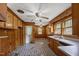 Functional kitchen with wood cabinets and ample counter space, ready for customization at 2715 E Geer St, Durham, NC 27704